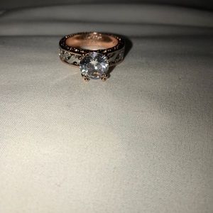 Rose gold and silver ring